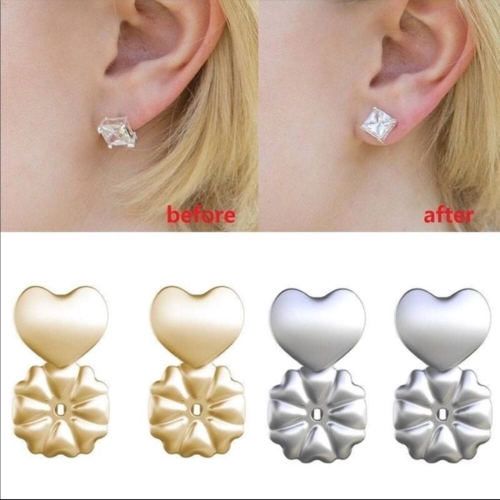 Earring backs. One silver, and one gold